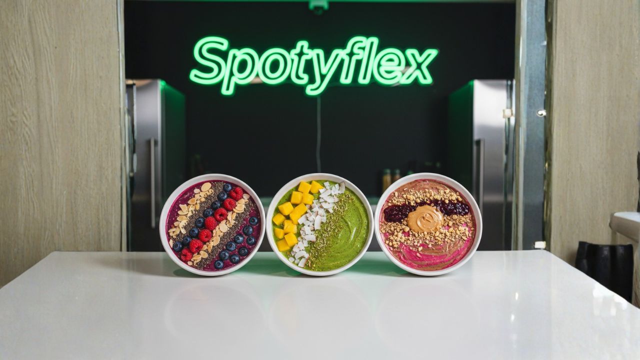 Low-calorie smoothie bowl topped with berries, seeds, and granola